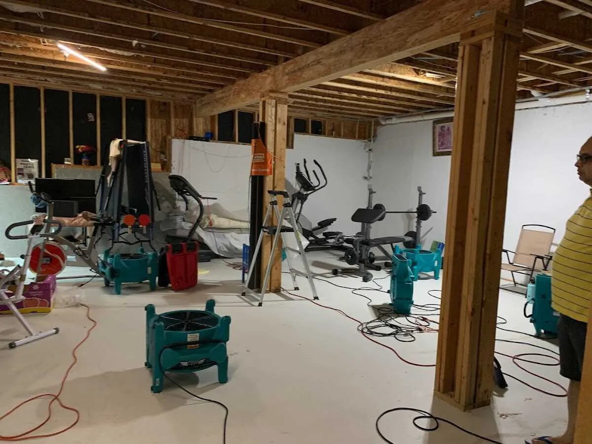 Basement drying equipment setup for Contents Cleaning & Restoration in Fargo