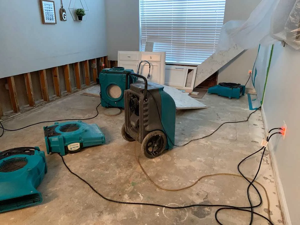 Dehumidifier in flood-cut room for Water Damage Restoration in Fargo