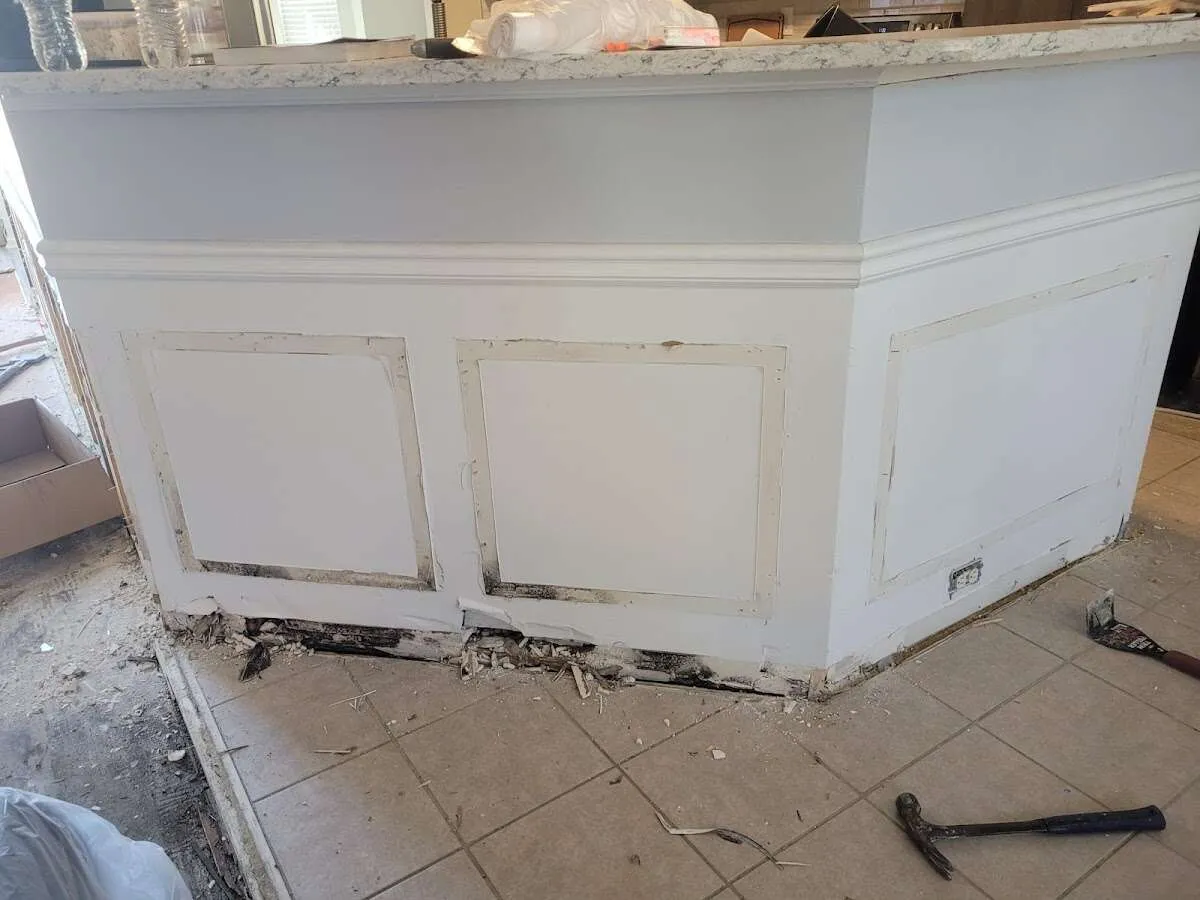 Water damage and mold on kitchen during Storm Damage Restoration in Fargo